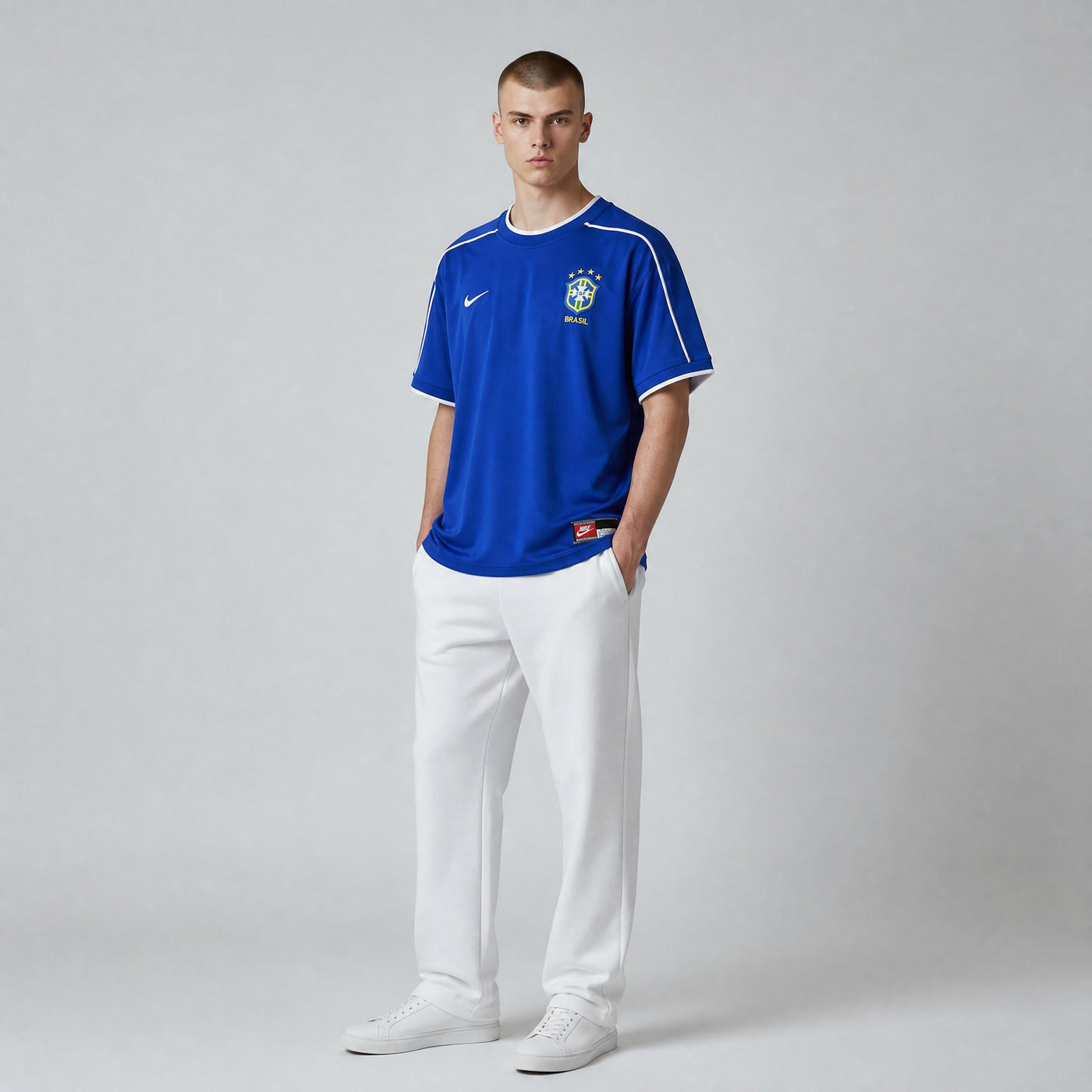 My Store 8 Brasil 1998 football jersey in royal blue with white trim and Nike swoosh. Features embroidered team crest.